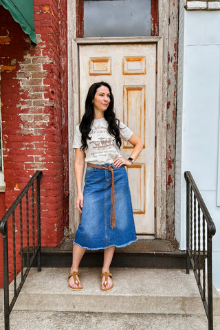 Denim midi skirt with frayed was it and hem, classic a-line style in 30" length 